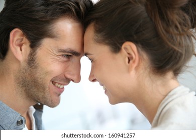 Profile of loving couple looking at each other