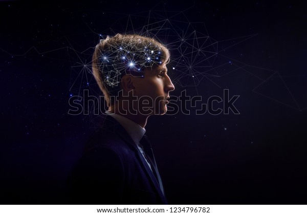 Profile of man\
with symbol neurons in brain. Thinking like stars, the cosmos\
inside human, background night\
sky