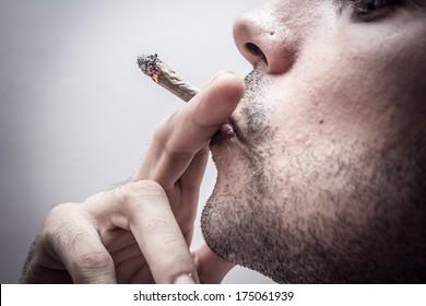 Profile of a person smoking