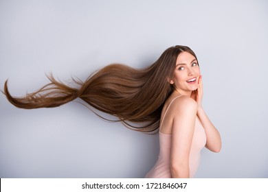 Profile photo of attractive cute model lady demonstrating ideal neat long healthy hairstyle flying on air after lamination procedure wear beige singlet isolated grey color background - Shutterstock ID 1721846047
