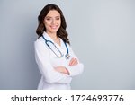 Profile photo of attractive family doc lady patients consultation friendly smiling reliable virology clinic arms crossed wear white lab coat stethoscope isolated grey color background