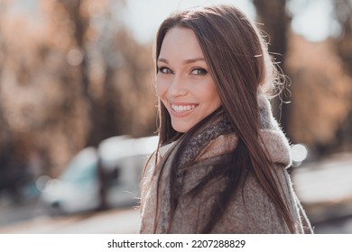 Profile photo of funky long brown hairdo lady wear coat scarf outside at the street - Shutterstock ID 2207288829