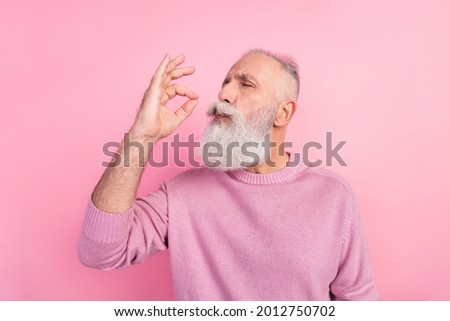 Profile photo of funny grey beard old man taste food wear pink sweater isolated on pastel color background