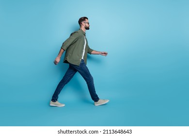 Profile Photo Of Intelligent Employee Guy Walk Career Steps Wear Specs Green Shirt Jeans Isolated Blue Color Background