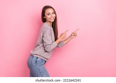 Profile Photo Of Pretty Positive Person Indicate Fingers Empty Space Blank Isolated On Pink Color Background