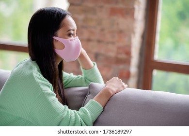 Profile Photo Of Pretty Sad Corona Virus Sick Patient Asian Chinese Lady Sit Cozy Couch Look Dreamy Window Missing Going Outdoors Need Keep Self Isolation Social Distance Stay Home Indoors