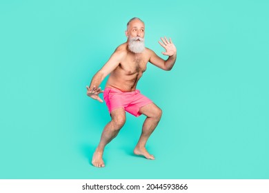 Profile Photo Of Shocked Amazed Old Man Dance Have Fun Enjoy Wear Pink Shorts Isolated Turquoise Color Background