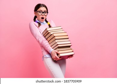 Profile Photo Of Shocked Student Lady Hold Heavy Books Pile Prepare Examination College University Big Homework Library Tired Wear Shirt Pullover Specs Isolated Pink Color Background