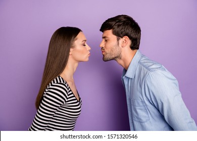 Profile Photo Of Two People Couple Guy Lady Standing Opposite Eyes Closed Romance Moment Kissing Affectionate Wear Stylish Casual Outfit Isolated Pastel Purple Color Background