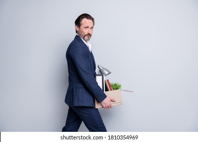Profile Photo Of Unhappy Worker Boss Mature Guy Hopeless Financial Crisis Lost Work Carry Carton Box Belongings Fired Quit Tired Walk Home Leaving Office Wear Suit Isolated Grey Background