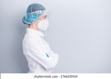 Profile Photo Of Virologist Doctor Lady Arms Crossed Nurse Surgeon Watch Intern Working Process Wear Medical Coat Mask Facial Plastic Protection Shield Surgical Cap Isolated Grey Background