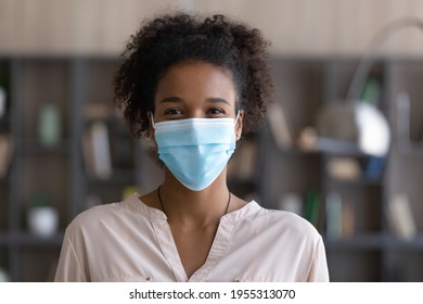 Profile Picture Of Smiling Biracial Woman In Facemask Against Covid-19. Headshot Portrait Of Happy African American Female In Facial Mask Protect From Corona Virus. Coronavirus, Healthcare Concept.