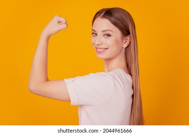 Profile Portrait Of Charming Strong Sportive Fit Lady Raise Hand Show Muscle On Yellow Background