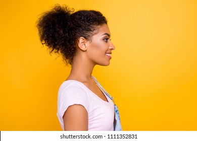 Profile Portrait Of Cute Gorgeous Girl With Beaming Smile Plump Lips In Casual Outfit Isolated On Yellow Background With Copyspace Empty Place