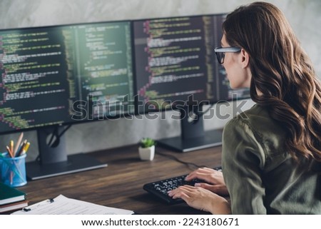 Profile portrait of intelligent talented hardware expert lady keyboard typing code open space indoors