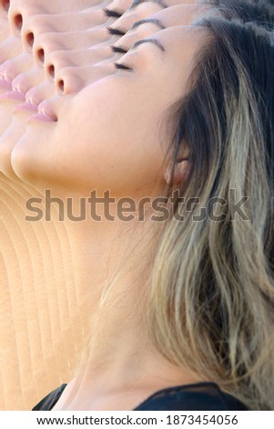 A profile portrait with multiple mirror reflections effect