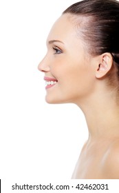 Profile Portrait Of Smiling Woman's Face With Clean Pure Skin Over White Background