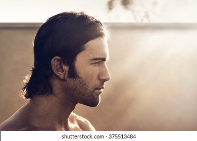 Profile Portrait Of Young Rugged Man With Vintage Tone And Style