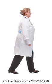 Profile Of Serious Doctor Woman Walk Isolated Over White Studio