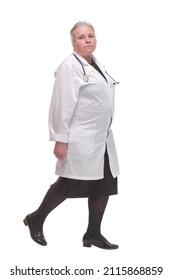 Profile Of Serious Doctor Woman Walking And Ready To Help