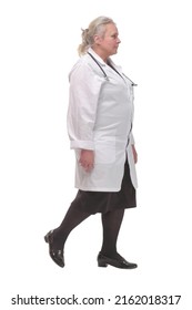 Profile Of Serious Doctor Woman Walking And Ready To Help