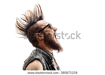 Profile shot of an angry young punk rocker with a Mohawk hairstyle screaming isolated on white background