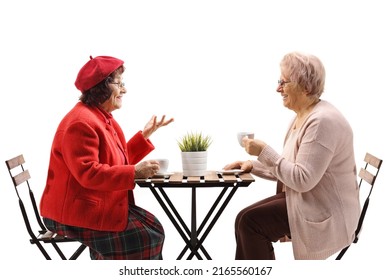 Profile Shot Of Two Senior Women Drinking Coffee And Talking Isolated On Wahite Background