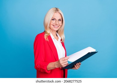 Profile side photo of business lady hold organizer paper documents agent boss isolated over blue color background