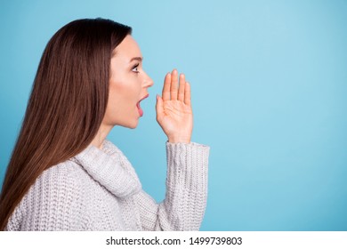 Profile Side Photo Of Impressed Girl Share Private Information Shout Wow Omg Unbelievable Wonderful Sales Wear Fashionable Jumper Isolated Over Blue Color Background