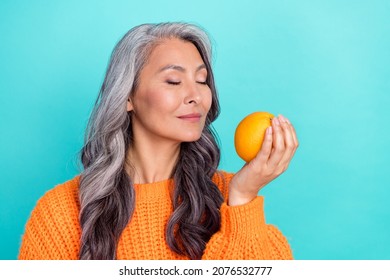 Profile Side Photo Of Mature Lady Aroma Smell Citrus Eco Organic Calories Isolated Over Teal Color Background