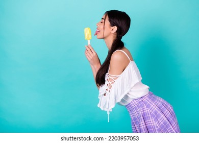 Profile Side Photo Of Playful Cute Lady Want Eat New Frozen Yogurt Pop Lick Tongue Isolated Cyan Color Background