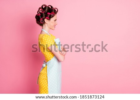 Profile side photo of positive girl with hair curlers cross hands look copyspace isolated over pastel color background