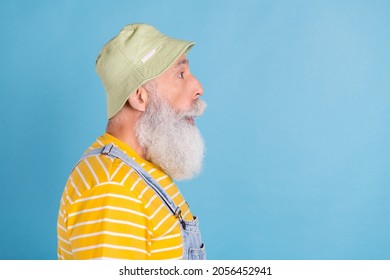 Profile Side Photo Of Senior Man Amazed Shocked News Information Look Empty Space Isolated Over Blue Color Background