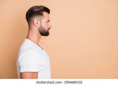 Profile Side Photo Of Young Handsome Confident Man Look Empty Space Isolated Over Beige Color Background