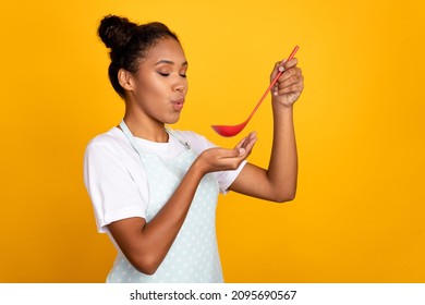 Profile Side Photo Of Young Pretty African Lady Blow Hot Dish Taste Delicious Isolated Over Yellow Color Background