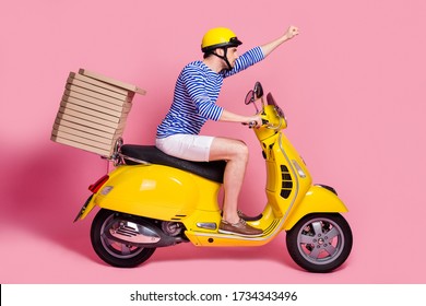 Profile Side View Of His He Nice Attractive Handsome Cool Confident Guy Driving Moped Delivering Pizza Fast Service Hurry Rush Isolated Over Pink Pastel Color Background