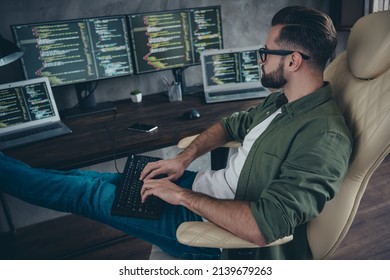 Profile Side View Portrait Of Attractive Focused Guy Tech Leader Writing Using Keyboard Html Process At Workplace Station Indoors.