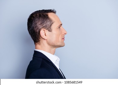 Profile, Side View Portrait With Copy Space Of Handsome Man Standing Over Gray Background, Advertisement Concept