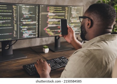 Profile Side View Portrait Of Handsome Focused Experienced Guy Geek Using Gadget Developing Project At Workplace Workstation Indoors