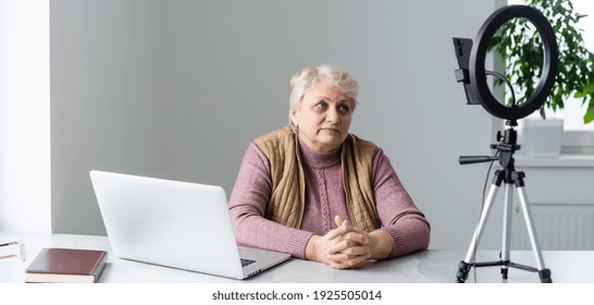 Profile Side View Portrait Of Her She Nice Attractive Addicted Focused Gray-haired Blonde Granny Playing Network Web Virtual Team Game At Industrial Loft Modern Concrete Style Interior House Flat