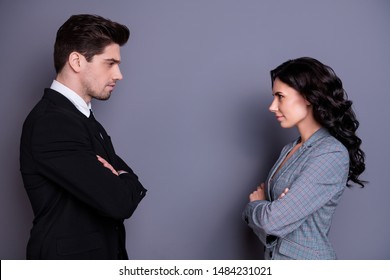 Profile side view portrait of his vs he her she  attractive serious stylish content focused partners leadership meeting acquaintance deciding folded arms in formal wear isolated over gray background