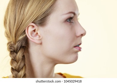 Profile Side View Portrait Of Young Woman Having Blonde Hair Braid Hairstyle.