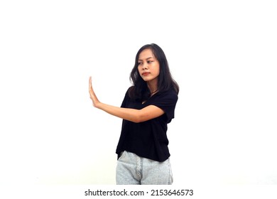 Profile Side View Portrait Of Young Girl Black Shirt Standing With Stop Hand Sign Gesture.