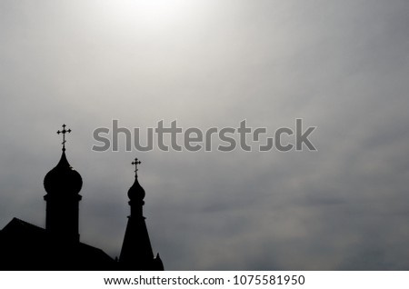Profile of the two domes of the church with Christian crosses against the background of sky skies
