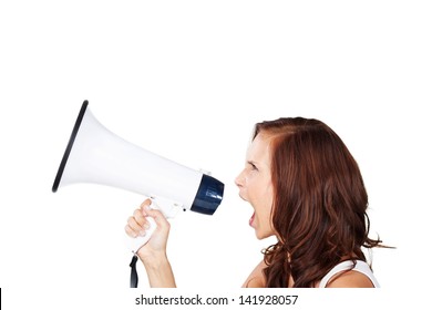 Profile View Of An Attractive Young Woman Shouting Into A Loud Haler Or Megaphone Making An Announcement Or To Get Attention, Isolated On White