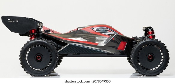 Profile View Of Buggy Rc Car Isolated On Studio Background