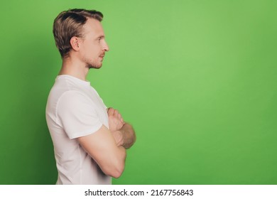 Profile View Photo Of Self-assured Strong Virile Man Folded Arms Blank Space Isolated On Green Color Background