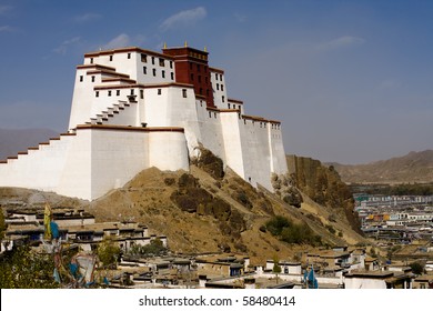 Profile view of the rebuilt Samdruptse Dzong fortress and monastery in Shigatse Tibet, traditional seat of the Panchen Lama.. Horizontal copy space