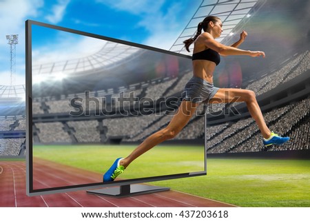 Profile view of sportswoman jumping against view of a stadium