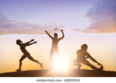 Profile view of sportswoman is practising javelin throw against clouds - Powered by Shutterstock